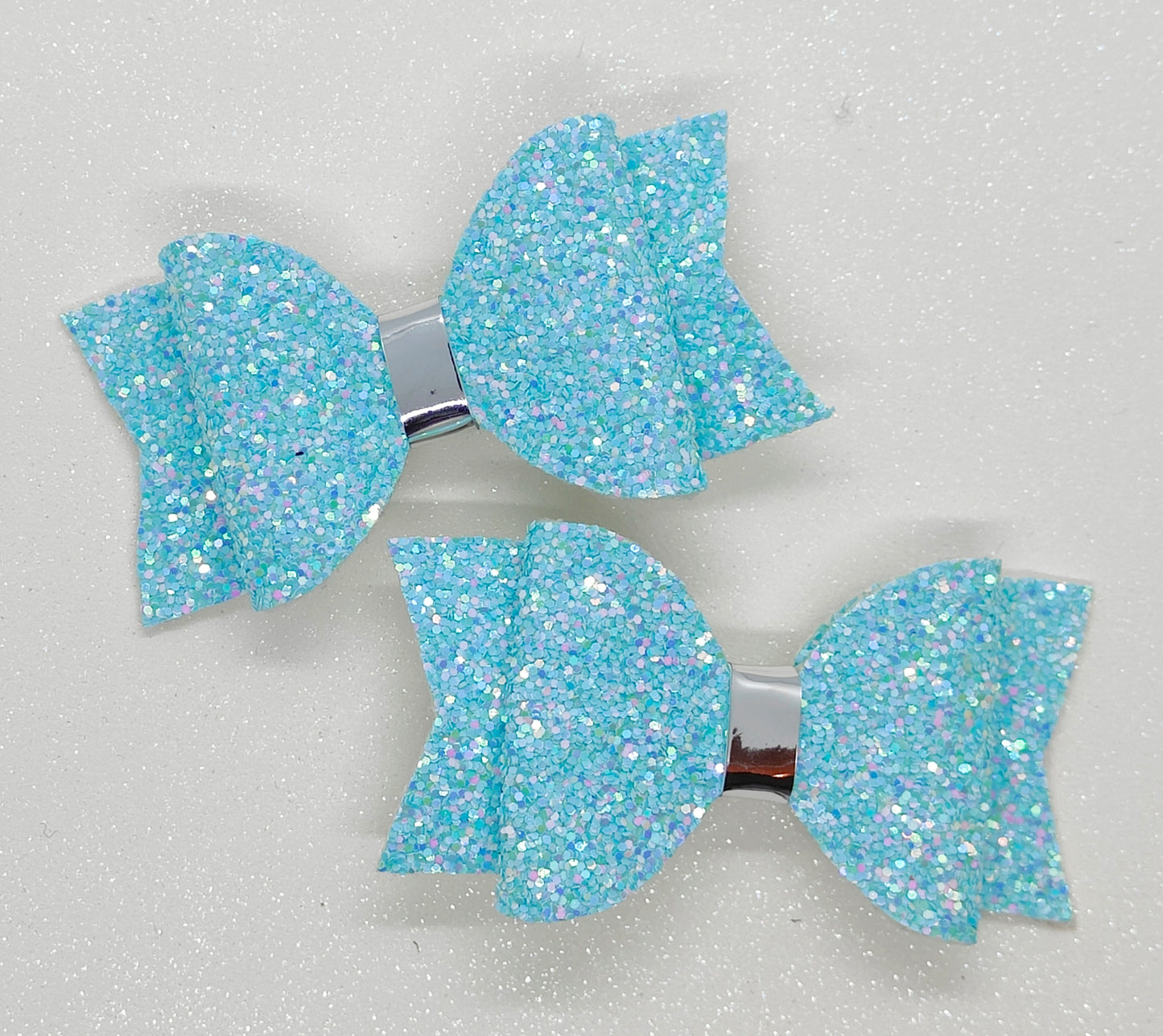 Blue sparkle pigtail bows